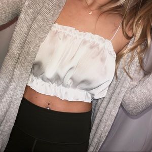 - SMALL WHITE RUFFLE CROPPED TANK TOP -